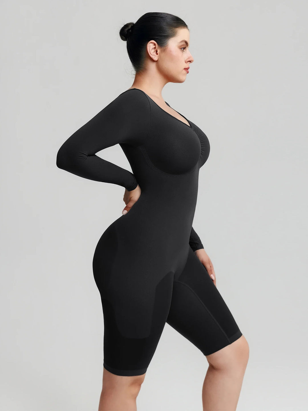 Ultra-stretch seamless shapewear top with targeted tummy control, ruched bust support, and breathable second-skin comfort, designed for versatile everyday wear from layering essential to stylish outerwear.