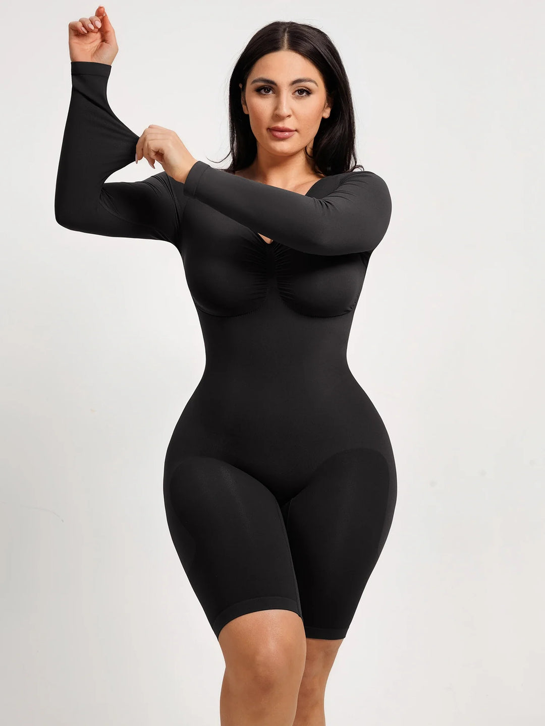 Ultra-stretch seamless shapewear top with targeted tummy control, ruched bust support, and breathable second-skin comfort, designed for versatile everyday wear from layering essential to stylish outerwear.