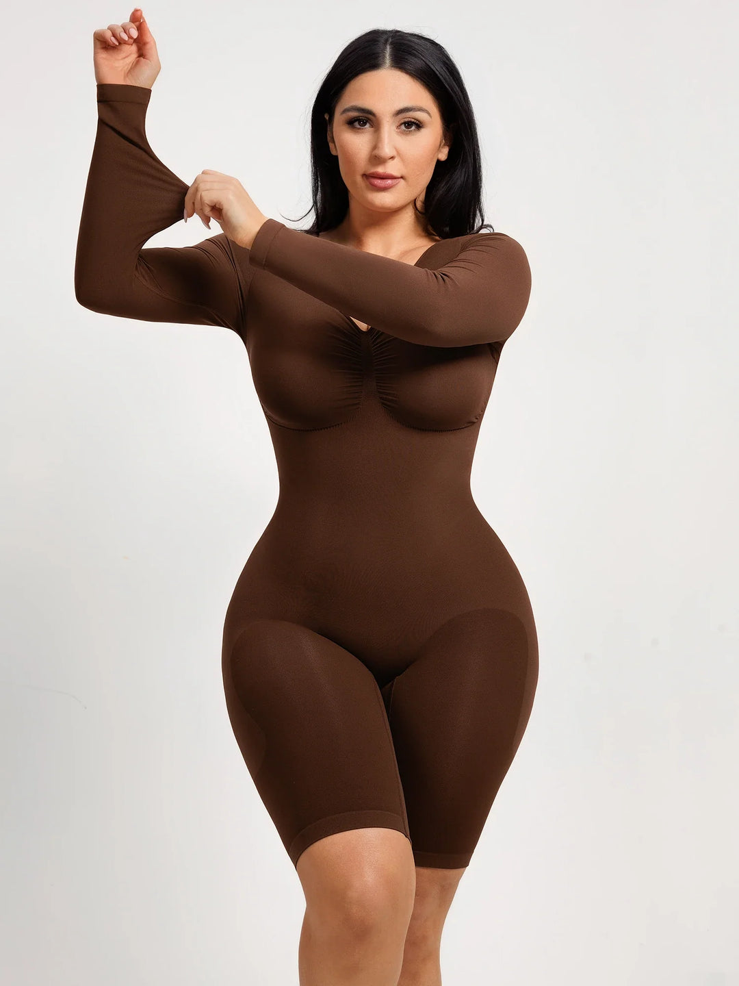 Ultra-stretch seamless shapewear top with targeted tummy control, ruched bust support, and breathable second-skin comfort, designed for versatile everyday wear from layering essential to stylish outerwear.