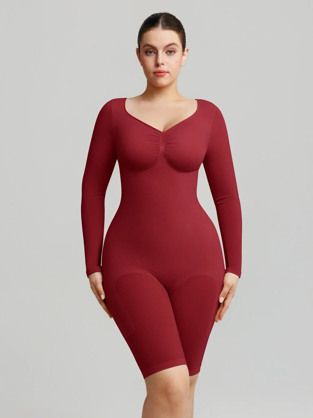 Ultra-stretch seamless shapewear top with targeted tummy control, ruched bust support, and breathable second-skin comfort, designed for versatile everyday wear from layering essential to stylish outerwear.