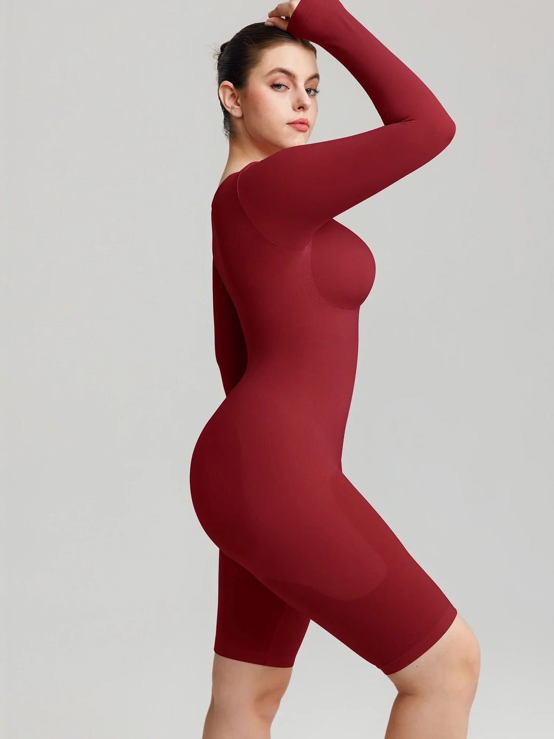 Ultra-stretch seamless shapewear top with targeted tummy control, ruched bust support, and breathable second-skin comfort, designed for versatile everyday wear from layering essential to stylish outerwear.