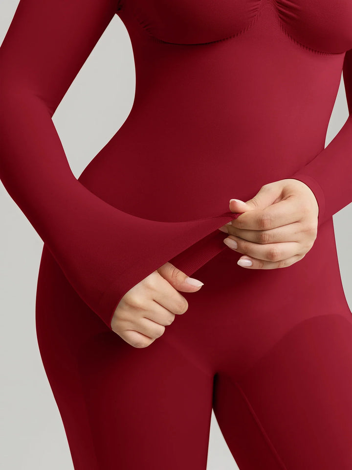 Ultra-stretch seamless shapewear top with targeted tummy control, ruched bust support, and breathable second-skin comfort, designed for versatile everyday wear from layering essential to stylish outerwear.